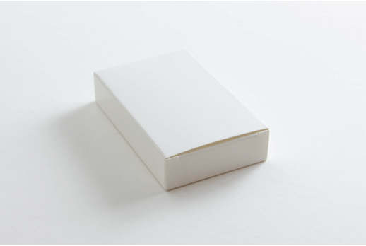 Біла картонна коробка 100*60*20 мм